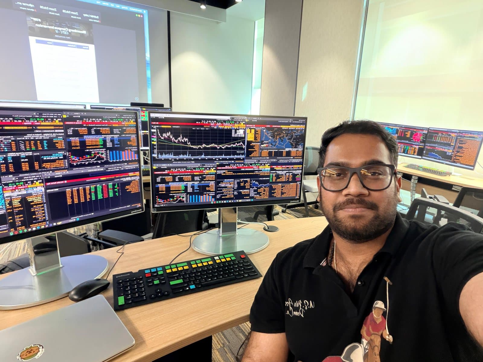 At a multi-monitor Bloomberg Terminal setup during the Capital Markets & Trading program